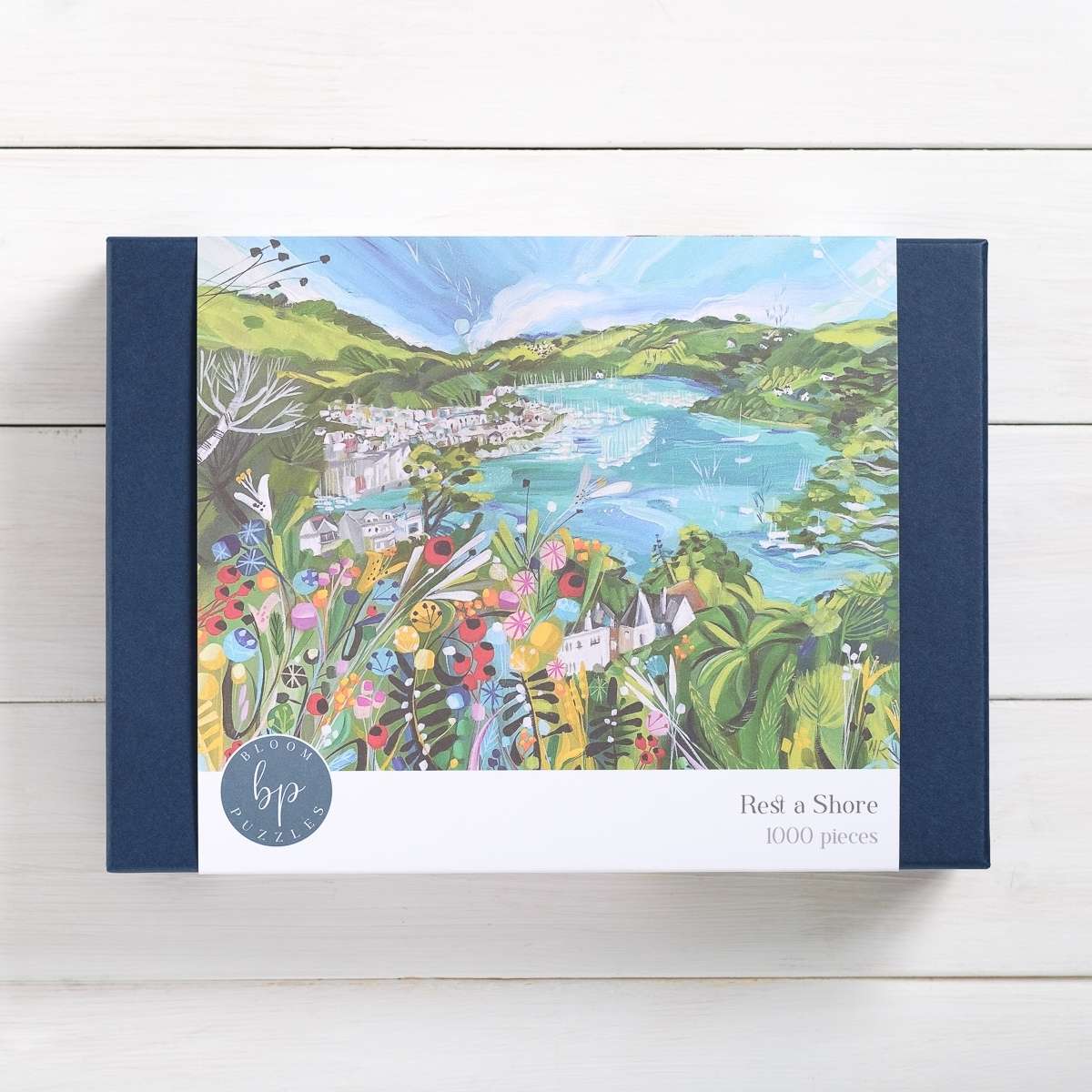 Bloom Puzzles Rest a Shore 1000 Piece Jigsaw Puzzle Front of Box Natalie Rymer