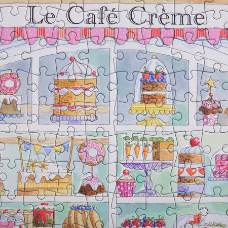 Bloom Puzzles Le Cafe 500 piece Jigsaw Cakes in the Window