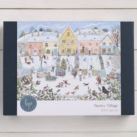 Bloom Puzzles Snowy Village 1000 piece Jigsaw Puzzle Front of Box