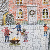 Bloom Puzzles Snowy Village 1000 piece Jigsaw Puzzle Close Up Firepit