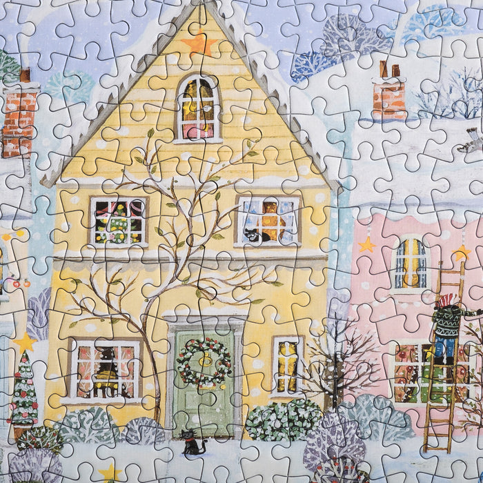 Bloom Puzzles Snowy Village 1000 piece Jigsaw Puzzle Close Up Yellow House